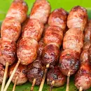 Espetinho de linguiça toscana