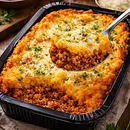 Escondidinho de Batata doce com molho de linguiça Blumenal