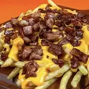 Batata frita com chedder e bacon 