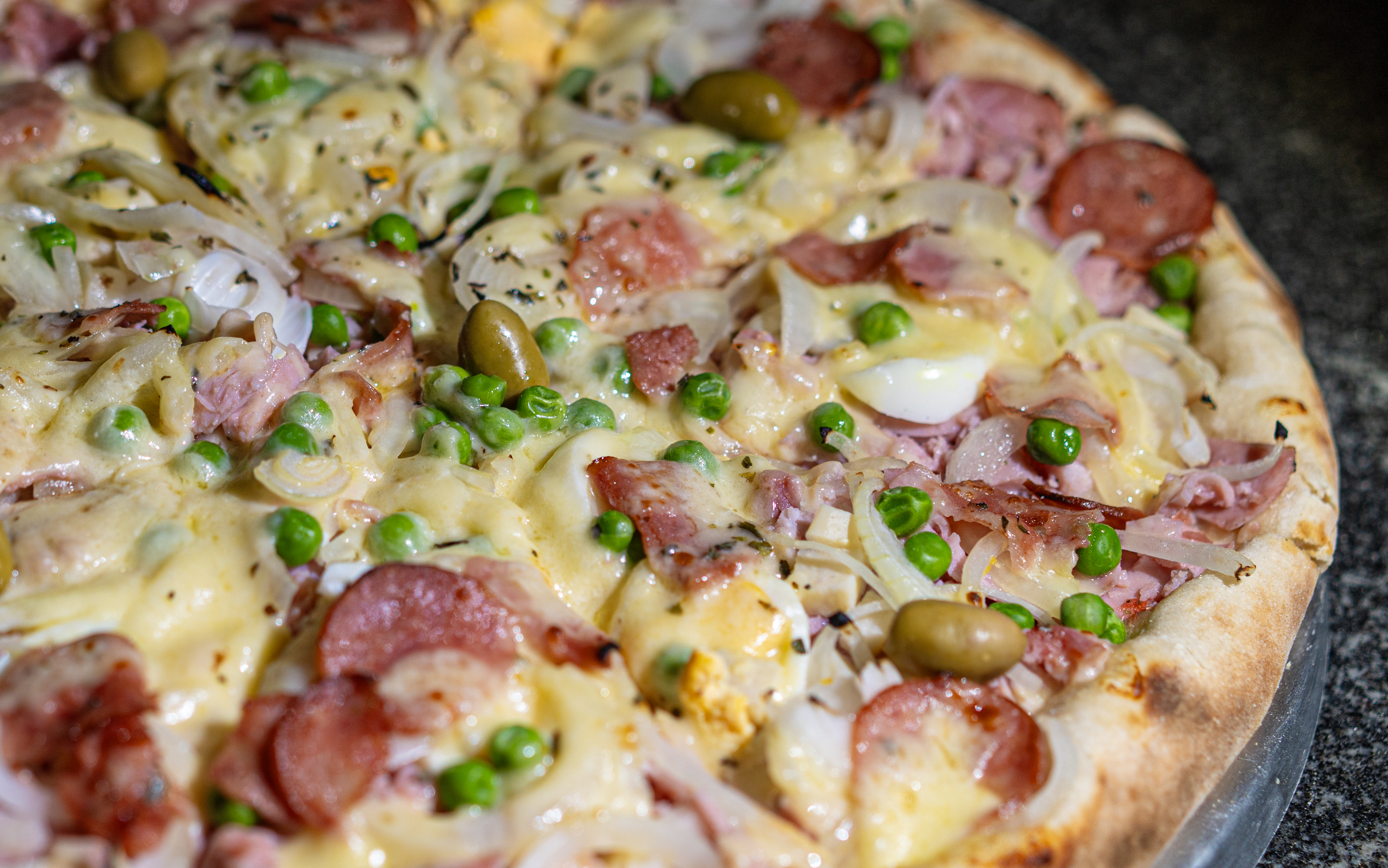 PIZZAS
