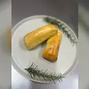 ENROLADINHO DE PRESUNTO E QUEIJO